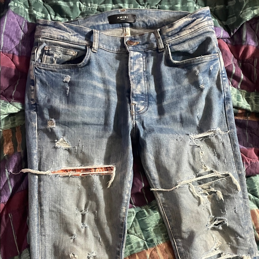 Distressed Blue Jeans